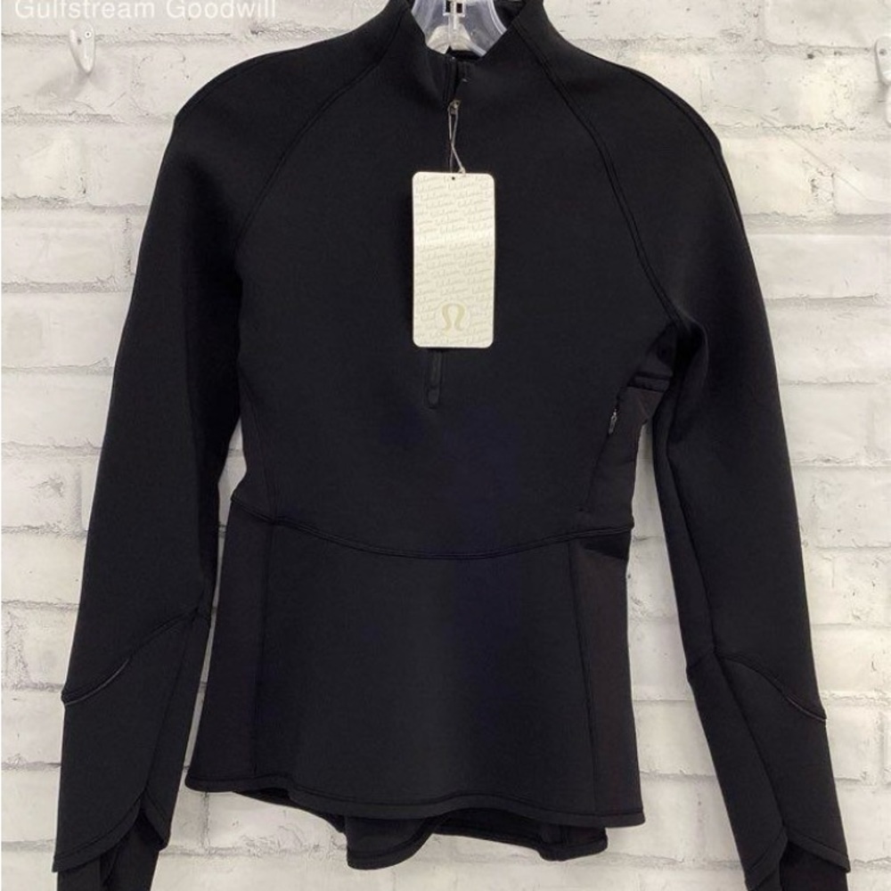 Half zip, slim fit, Lululemon jacket. Size 4 new with tags